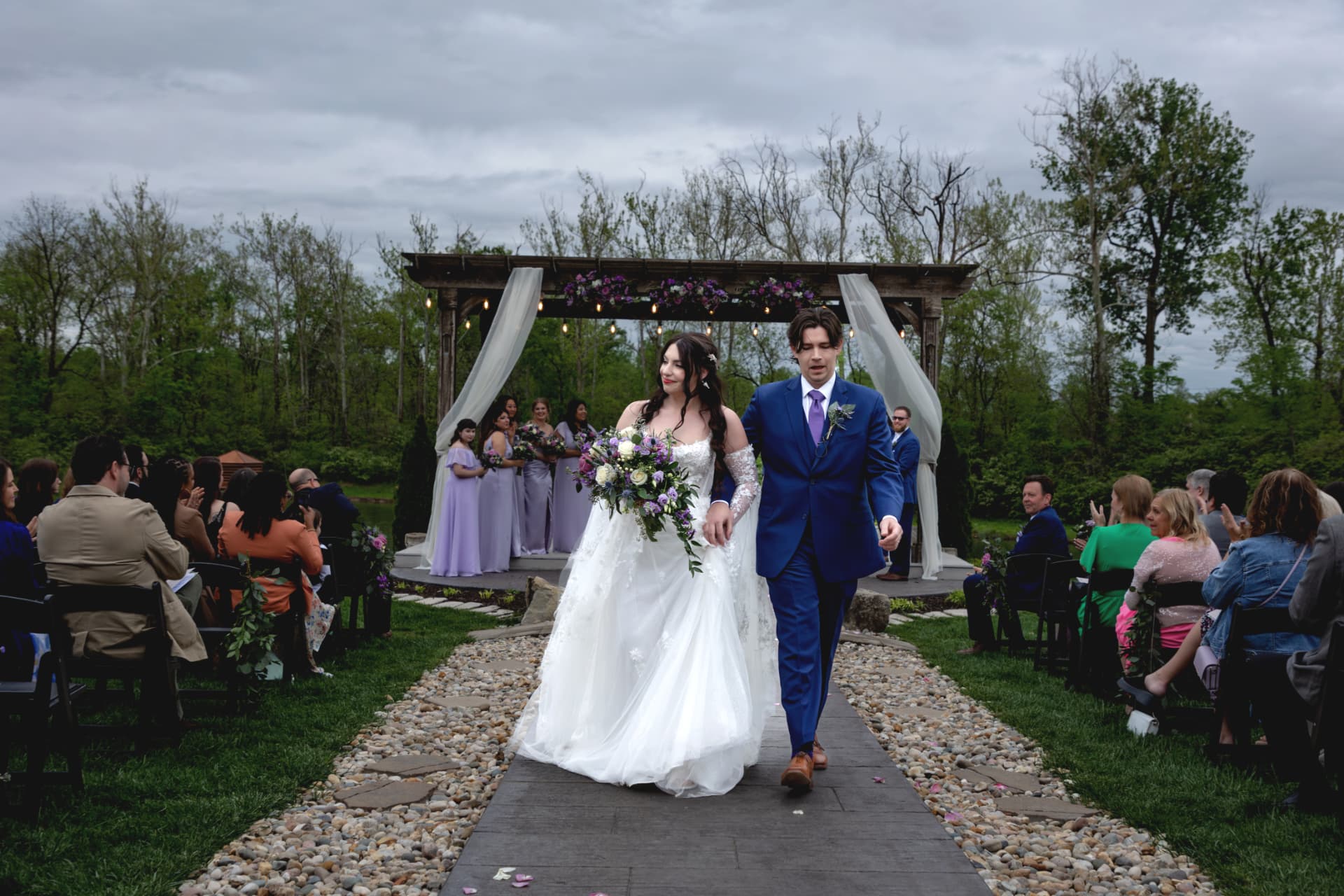 Tristan and Maddie walking back down the aisle together