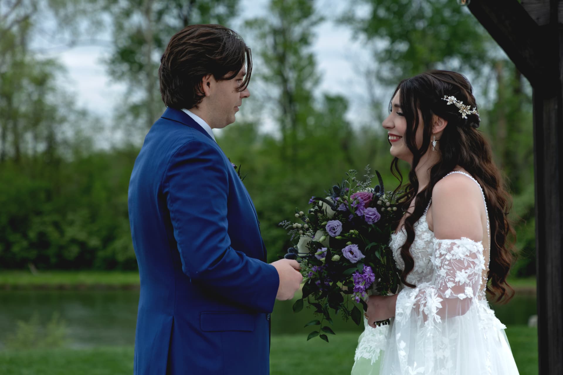 Tristan and Maddie together outdoors with purple flowers