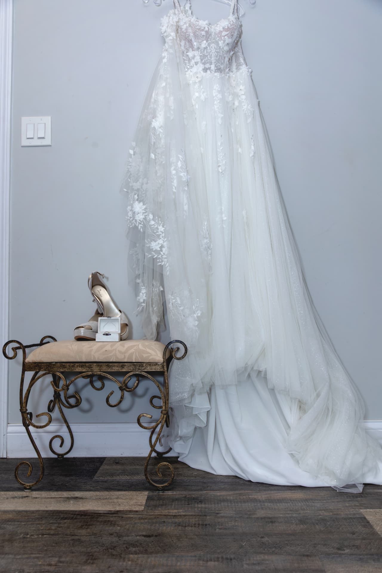 Wedding dress hanging in the getting-ready room