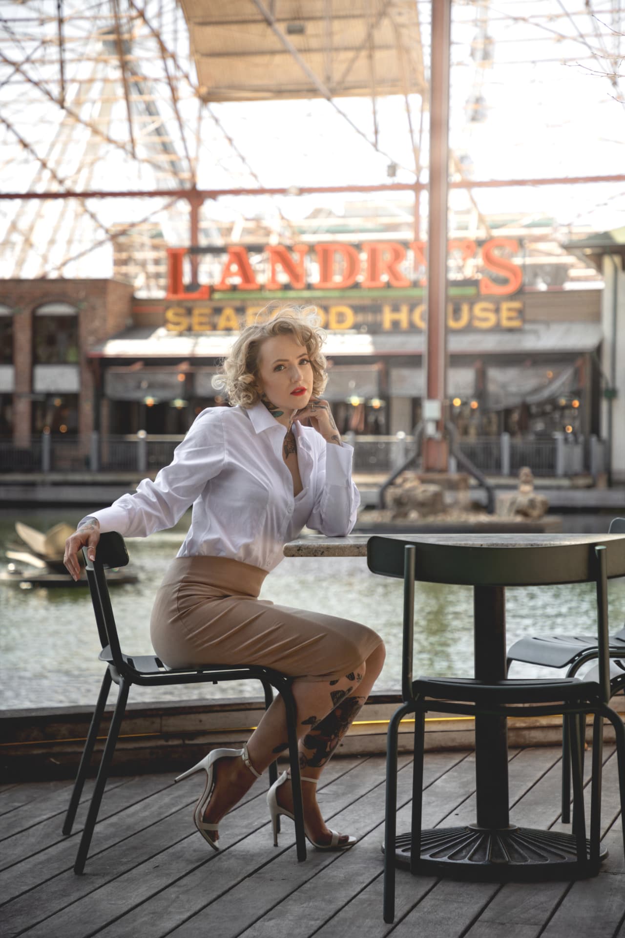 Creative portrait session at a waterside table